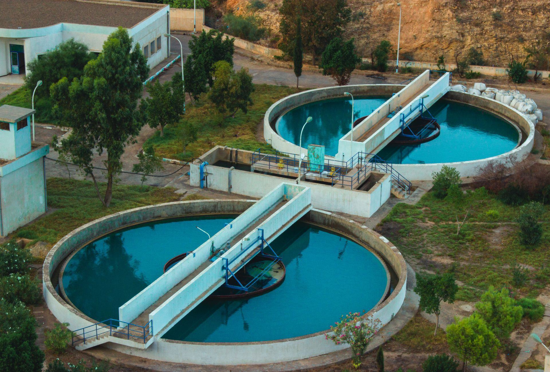 Aerial view of circular clarifier tanks at a water and sanitation works